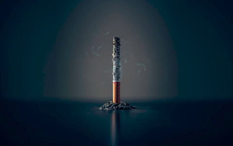 Person feeling calm and free at home after quitting smoking with hypnotherapy, even while living with a partner who smokes
