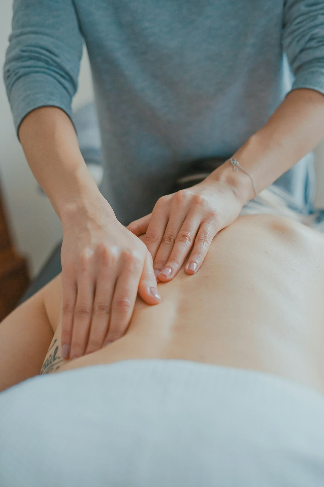 Person sitting calmly with eyes closed, practising relaxation — representing how hypnotherapy helps overcome needle phobia and injection anxiety