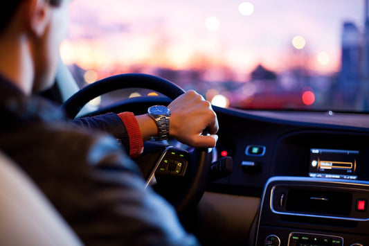 A calm, open road stretching through countryside, representing confidence and freedom while driving