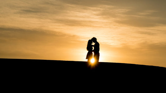 A peaceful couple sitting together calmly, representing connection and security in relationships