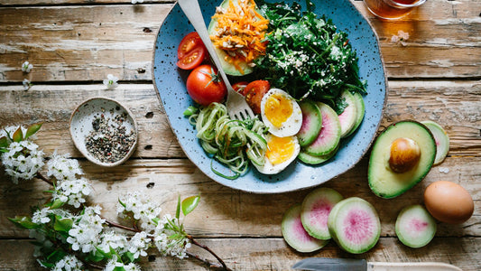 A colourful spread of fresh vegetables and whole foods representing healthy, intuitive eating without restrictive dieting