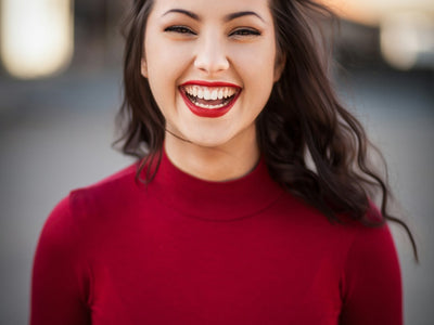 Confident woman smiling — hypnotherapy for weight loss