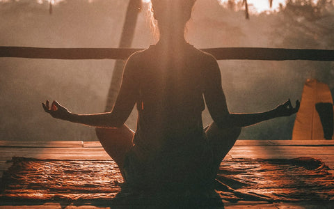 Person sitting calmly with eyes closed in a peaceful, relaxed state, representing the complementary use of hypnotherapy and medication for mental wellbeing