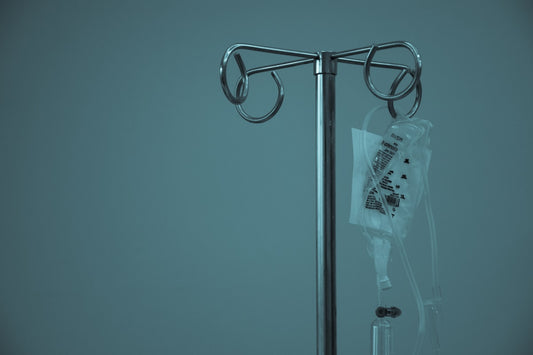 Person breaking free from cigarettes, representing the benefits of hypnotherapy for smoking cessation