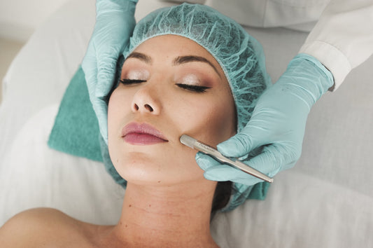 Woman applying cream gently — symbolising the mind-skin connection in hypnotherapy research